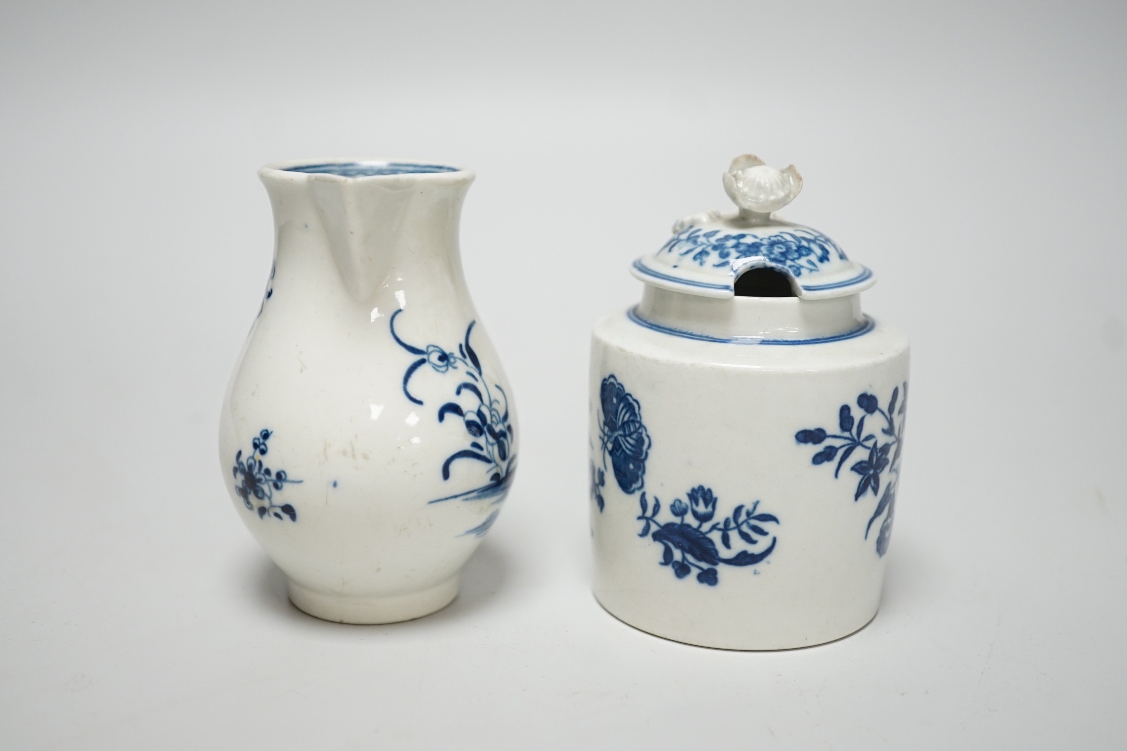 An 18th century Caughley rare sparrowbeak jug painted with the Waiting Chinaman pattern, handle repaired and a Caughley mustard pot and cover with 'Three Flowers', jug 9cms high